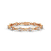 This exquisite tennis bracelet features 62 emerald-shaped diamonds, totaling 7.01 carats. With a 6.50-inch length, it is a stunning accessory that offers a perfect balance of brilliance and sophistication.