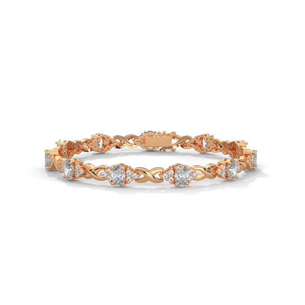 This exquisite tennis bracelet features 62 emerald-shaped diamonds, totaling 7.01 carats. With a 6.50-inch length, it is a stunning accessory that offers a perfect balance of brilliance and sophistication.