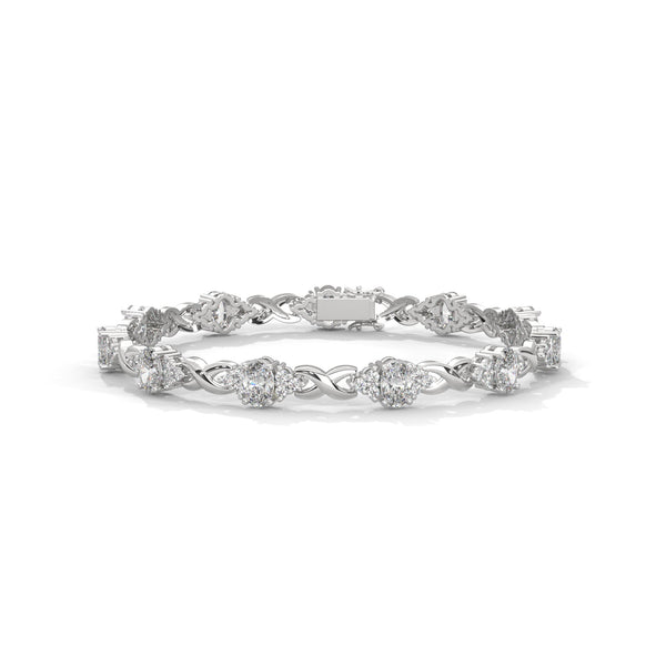 This exquisite tennis bracelet features 62 emerald-shaped diamonds, totaling 7.01 carats. With a 6.50-inch length, it is a stunning accessory that offers a perfect balance of brilliance and sophistication.