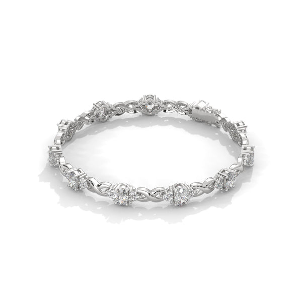 This exquisite tennis bracelet features 62 emerald-shaped diamonds, totaling 7.01 carats. With a 6.50-inch length, it is a stunning accessory that offers a perfect balance of brilliance and sophistication.