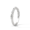 A whimsical yellow gold band featuring alternating bezel and pavé-set diamonds, creating a playful, elegant sparkle.