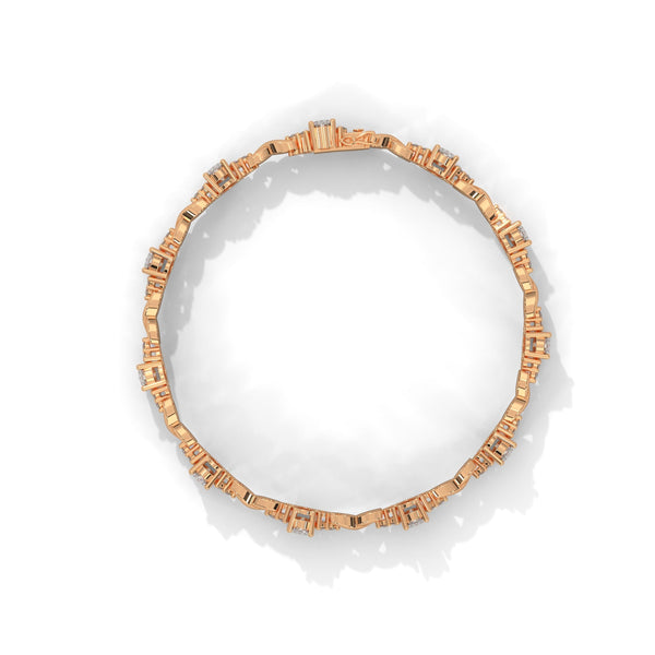 This exquisite tennis bracelet features 62 emerald-shaped diamonds, totaling 7.01 carats. With a 6.50-inch length, it is a stunning accessory that offers a perfect balance of brilliance and sophistication.