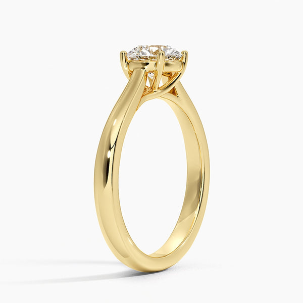 Astrielle Grace radiates refined simplicity with its elegant cathedral setting and softly tapered band, offering a timeless frame for its center diamond.