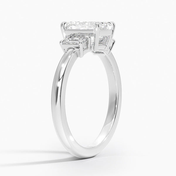 "A timeless emerald-cut diamond ring in radiant yellow gold, crafted for brilliance, luxury, and unforgettable elegance in every moment."