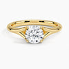 A modern solitaire with sculptural grace, the Seraphine Crest features elegantly arched prongs lifting a brilliant round diamond in a soft, sweeping embrace.