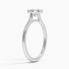Liora Crest captures the essence of modern grace, featuring a sculptural split-shank design and a bezel-style crown accented with fine milgrain.