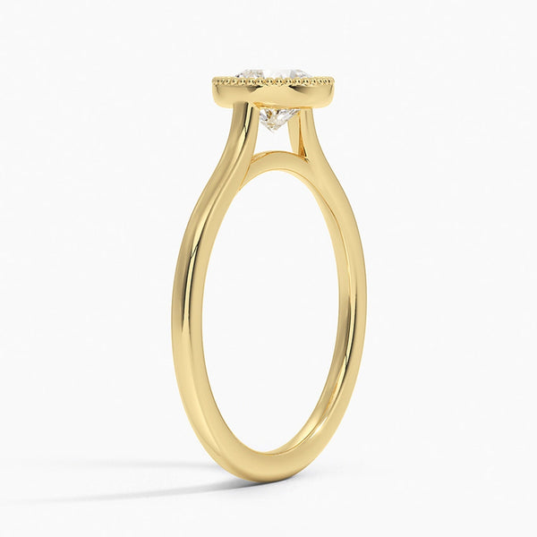 Liora Crest captures the essence of modern grace, featuring a sculptural split-shank design and a bezel-style crown accented with fine milgrain.