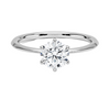 Solenya Whisper is a sleek, minimalist solitaire ring that blends subtle elegance with enduring craftsmanship, letting its brilliant center diamond speak volumes.