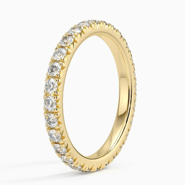 “Radiant diamond eternity band crafted in lustrous yellow gold, delivering timeless sparkle, luxury brilliance, and perfect elegance for every unforgettable moment.”